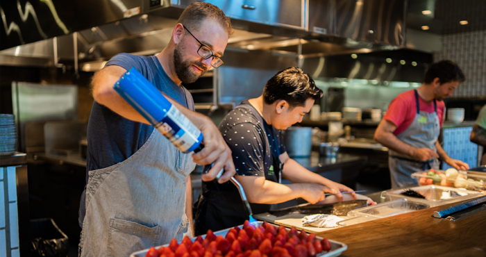 A chef preparing dessers