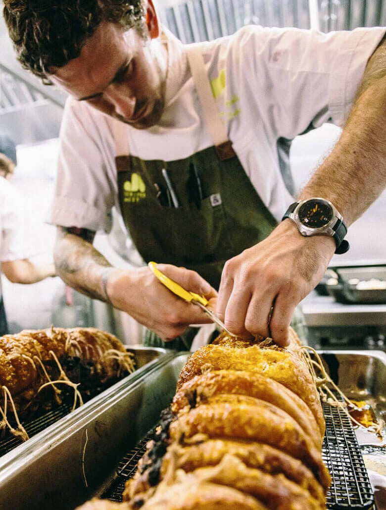 A chef preparing meals for dinner