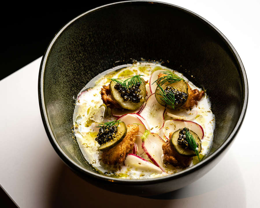 Bowl of food on white table