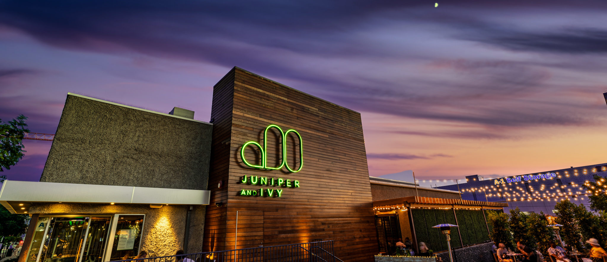 Exterior of building with Juniper and Ivy logo