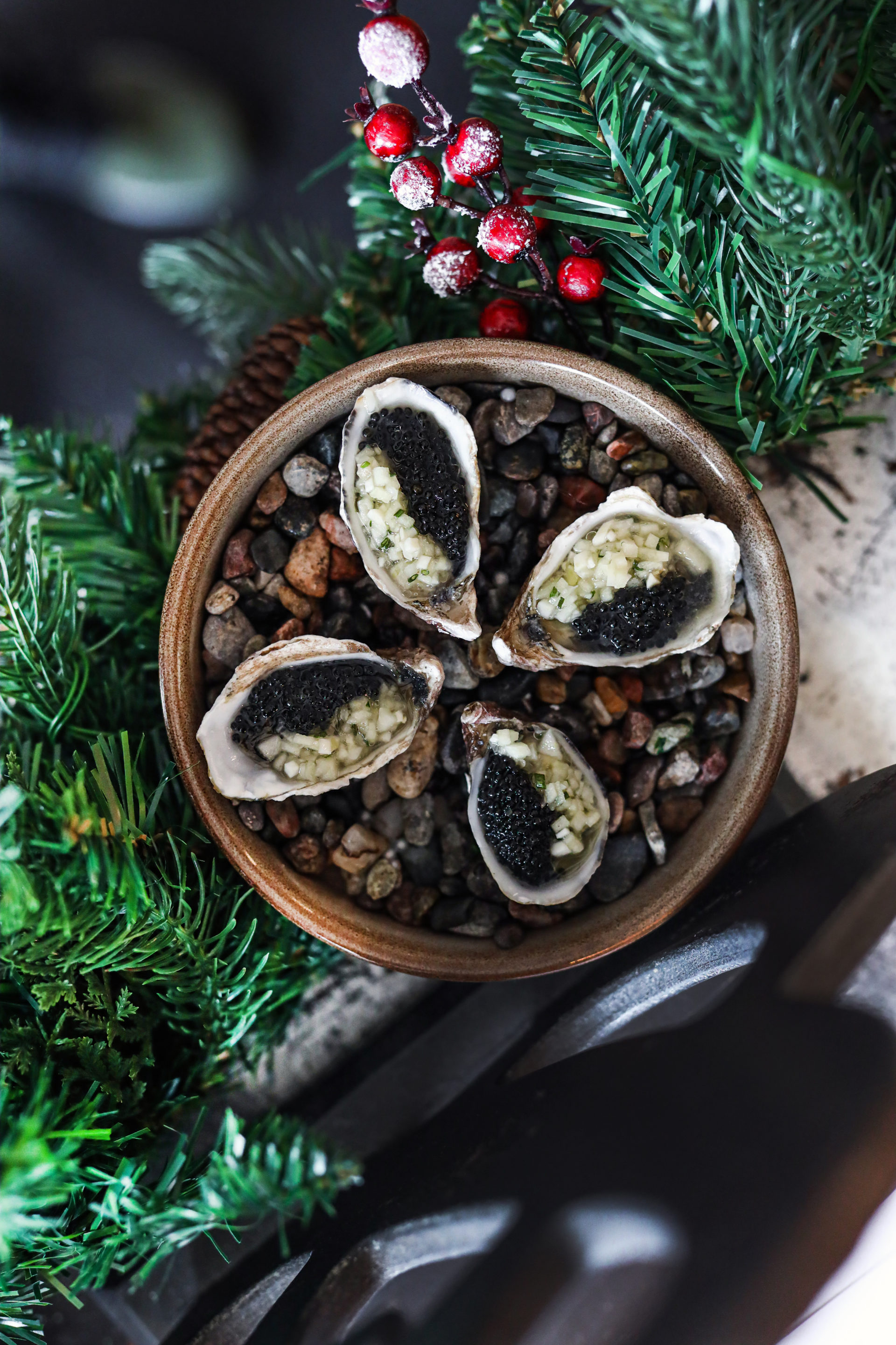 Oysters surrounded by holly