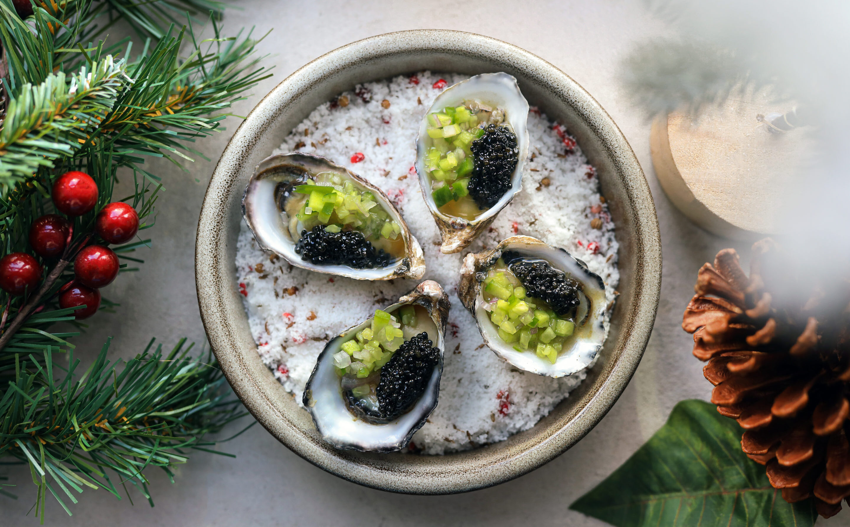 Oysters surrounded by garland