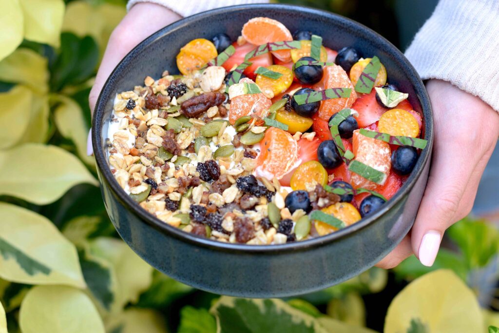 Bowl of yogurt, seeds, and fruit