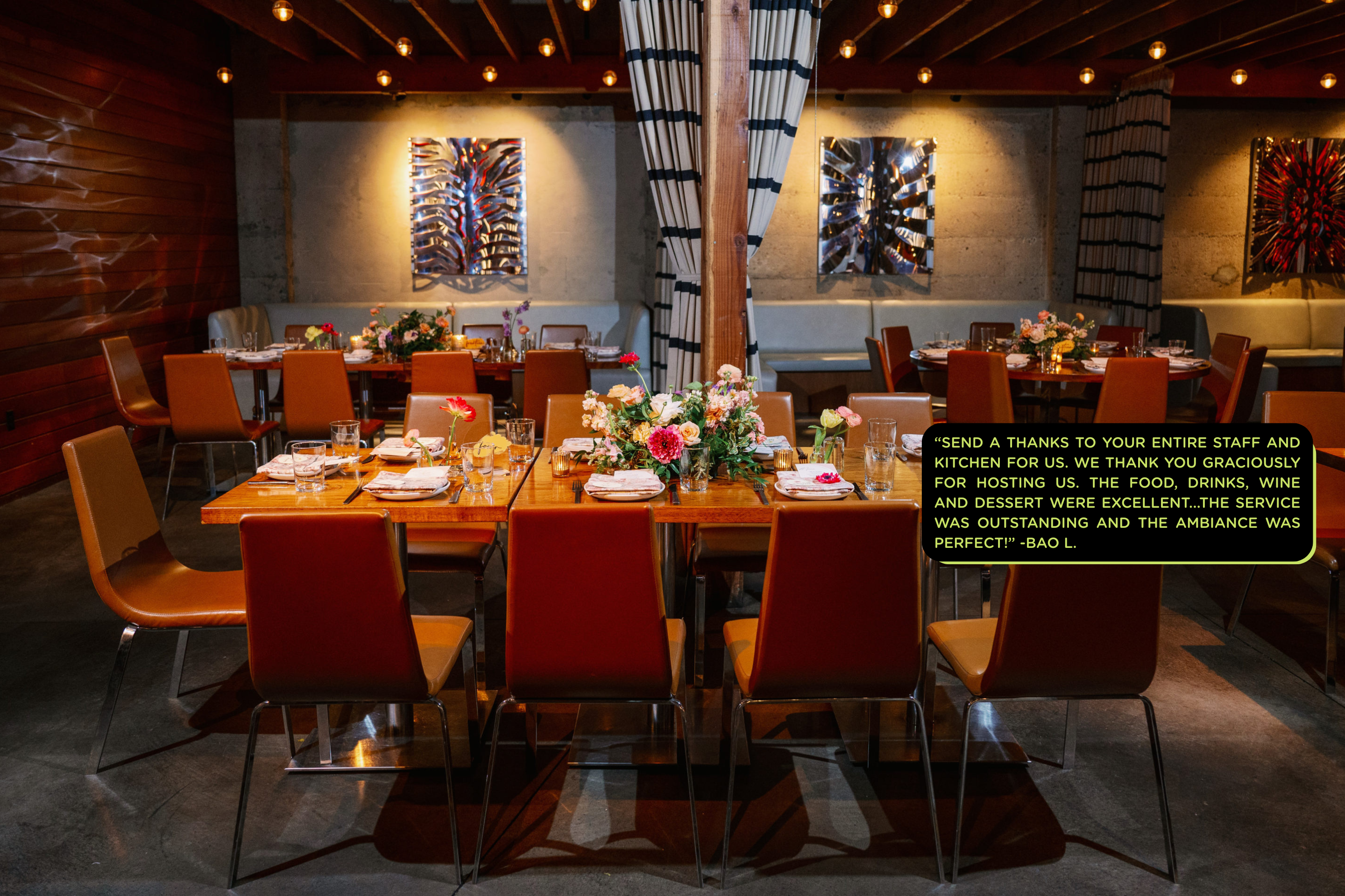 A table in a restaurant decorated with flowers and dishware with text overlay.